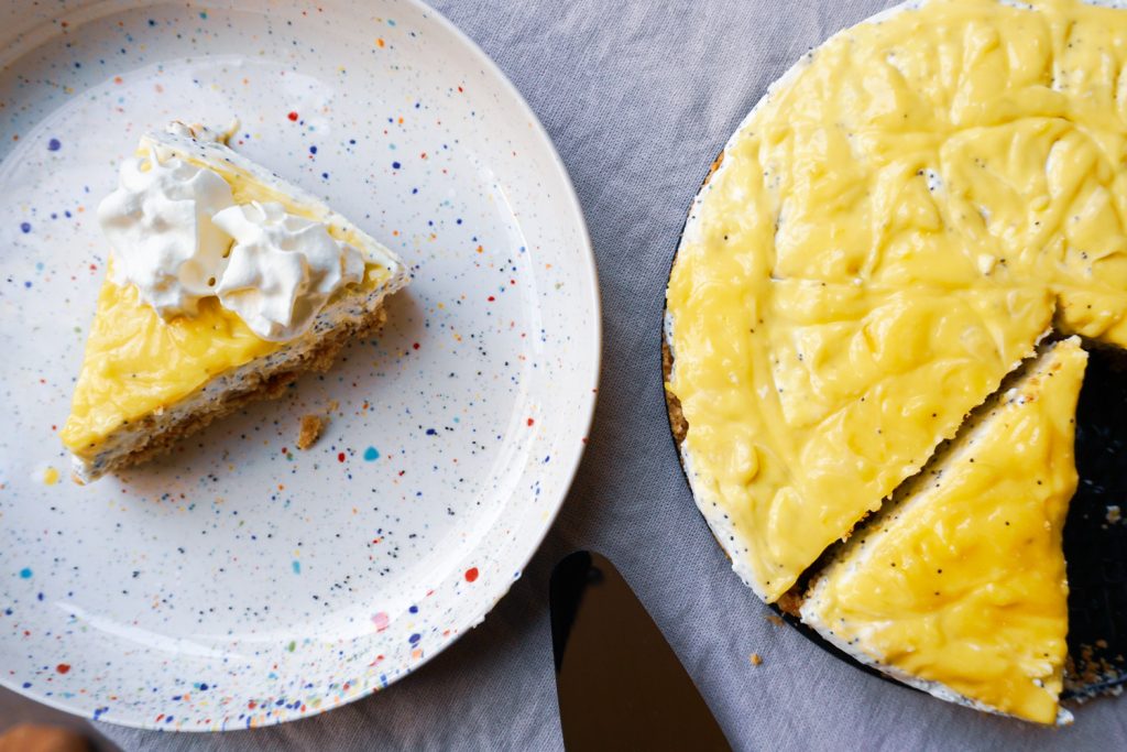 No-bake lemon poppy seed cheesecake slice with lemon curd swirl