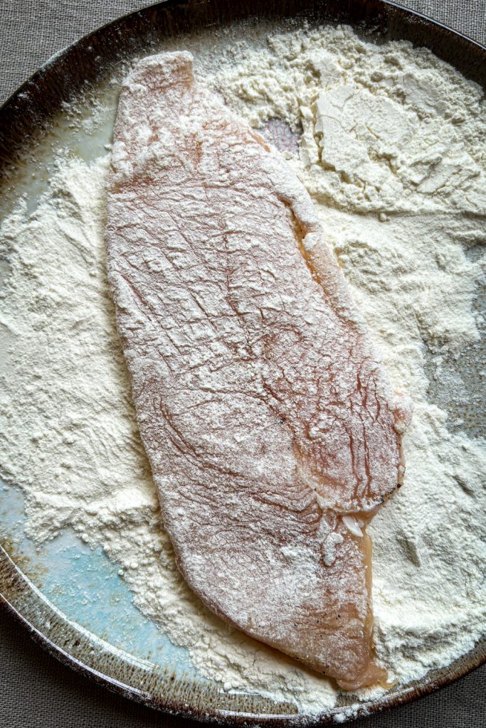 first coat chicken in flour